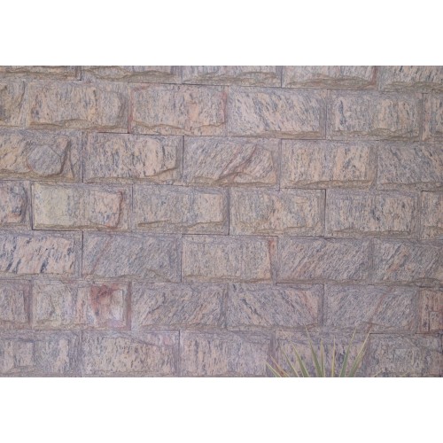Pedras Girardi - Muro revestido com pedra madeira rosa